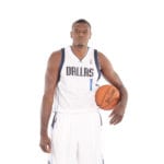 Left – Samuel Dalembert in Mavs uniform