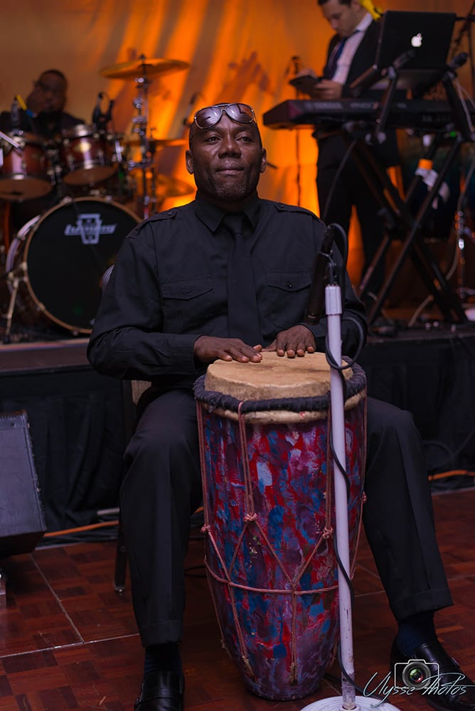 Emil playing tanbou at a Haitian party, Miami, 2018