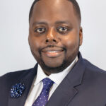 NBMG – Commissioner McKenzie Fleurimond