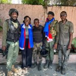 Bertrhude Albert with security – IG